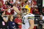 GLENDALE, AZ - JANUARY 10:  Spencer Havner #41 of the Green Bay Packers celebrates his touchdown against the Arizona Cardinals in the fourth quarter of the 2010 NFC wild-card playoff game at University of Phoenix Stadium on January 10, 2010 in Glendale, Arizona.  (Photo by Christian Petersen/Getty Images)