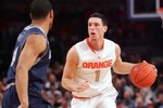 NEW YORK - MARCH 11:  Andy Rautins #1 of the Syracuse Orange handles the ball during the quarterfinal of the 2010 NCAA Big East Tournament at Madison Square Garden on March 11, 2010 in New York City.  (Photo by Chris Trotman/Getty Images)