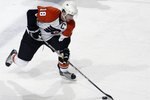 BUFFALO, NY - MARCH 5:  Mike Richards #18 of the Philadelphia Flyers skates with the puck during the game against the Buffalo Sabres at HSBC Arena on March 5, 2010 in Buffalo, New York. (Photo by Rick Stewart/Getty Images)