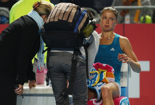 MELBOURNE, AUSTRALIA - JANUARY 24:  Dinara Safina of Russia seeks medical attention during her fourth round match against Maria Kirilenko of Russia during day seven of the 2010 Australian Open at Melbourne Park on January 24, 2010 in Melbourne, Australia.  (Photo by Cameron Spencer/Getty Images)