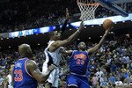 ORLANDO, FL - FEBRUARY 21:  LeBron James #23 of the Cleveland Cavaliers attempts a shot over Dwight Howard #12 of the Orlando Magic at Amway Arena on February 21, 2010 in Orlando, Florida. NOTE TO USER: User expressly acknowledges and agrees that, by downloading and/or using this Photograph, user is consenting to the terms and conditions of the Getty Images License Agreement.  (Photo by Sam Greenwood/Getty Images)
