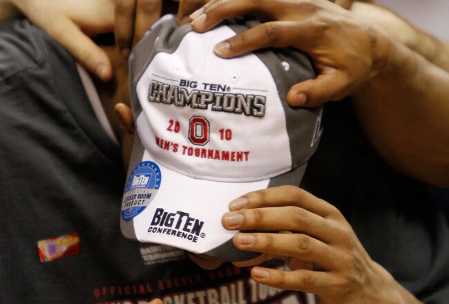 INDIANAPOLIS - MARCH 14:  Guard Evan Turner #21 of the Ohio State Buckeyes is congratulated by his teammates after being named the Big Ten Men's Basketball Tournament MVP following the championship game at Conseco Fieldhouse on March 14, 2010 in Indianapolis, Indiana. The Buckeyes defeated the Minnesota Golden Gophers 90-61 in the final.  (Photo by Jonathan Daniel/Getty Images)