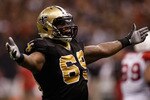 NEW ORLEANS - JANUARY 16:  Anthony Hargrove #69 of the New Orleans Saintsreacts to a play against the Arizona Cardinals during the NFC Divisional Playoff Game at Louisana Superdome on January 16, 2010 in New Orleans, Louisiana.  (Photo by Chris Graythen/Getty Images)