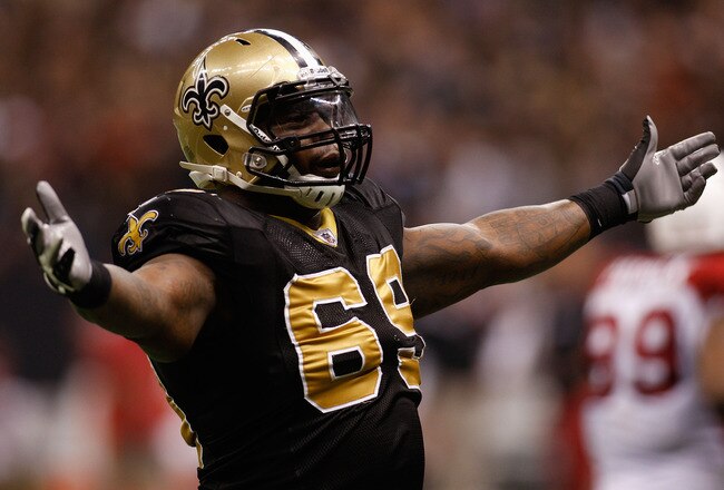 NEW ORLEANS - JANUARY 16:  Anthony Hargrove #69 of the New Orleans Saintsreacts to a play against the Arizona Cardinals during the NFC Divisional Playoff Game at Louisana Superdome on January 16, 2010 in New Orleans, Louisiana.  (Photo by Chris Graythen/Getty Images)