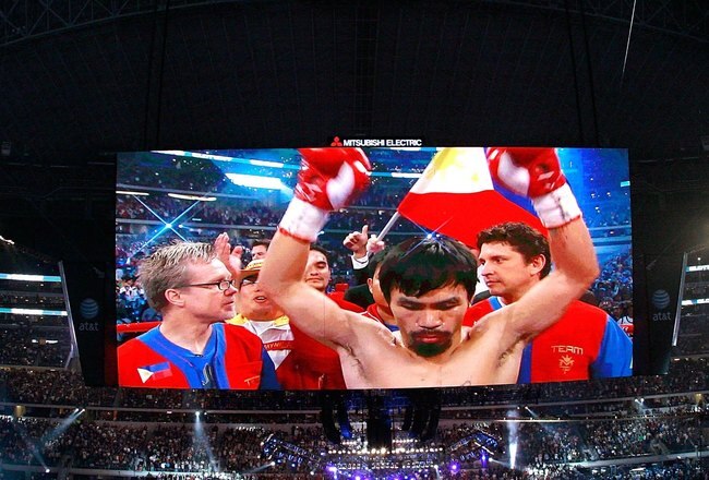 ARLINGTON, TX - MARCH 13:  Manny Pacquiao of the Philippines in the ring before taking on Joshua Clottey of Ghana during the WBO welterweight title fight at Cowboys Stadium on March 13, 2010 in Arlington, Texas.  (Photo by Tom Pennington/Getty Images)