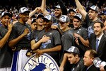GREENSBORO, NC - MARCH 14:  The Duke Blue Devils celebrate their win over the Georgia Tech Yellow Jackets in the championship game of the 2010 ACC Men's Basketball Tournament at the Greensboro Coliseum on March 14, 2010 in Greensboro, North Carolina.  (Photo by Jeff Zelevansky/Getty Images)
