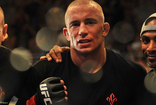 LAS VEGAS - JULY 11:  Georges St. Pierre celebrates his victory against Thiago Alves during their welterweight title bout during UFC 100 on July 11, 2009 in Las Vegas, Nevada. St. Pierre defeated Alves by unanimous decision.  (Photo by Jon Kopaloff/Getty Images)