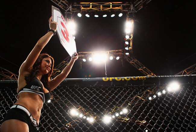 SYDNEY, AUSTRALIA - FEBRUARY 21: A ring girl displays the third round card during the Ultimate Fighting Championship fights at Acer Arena on February 21, 2010 in Sydney, Australia.  (Photo by Mark Nolan/Getty Images)