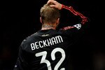 MANCHESTER, ENGLAND - MARCH 10: David Beckham of AC Milan shows his dissapointment after the UEFA Champions League First Knockout Round, second leg match between Manchester United and AC Milan at Old Trafford on March 10, 2010 in Manchester, England.  (Photo by Laurence Griffiths/Getty Images)
