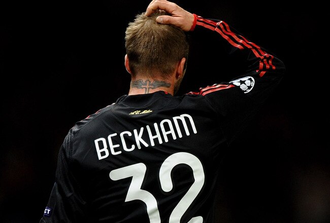 MANCHESTER, ENGLAND - MARCH 10: David Beckham of AC Milan shows his dissapointment after the UEFA Champions League First Knockout Round, second leg match between Manchester United and AC Milan at Old Trafford on March 10, 2010 in Manchester, England.  (Photo by Laurence Griffiths/Getty Images)
