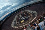 BRISTOL, TN - AUGUST 22:  A general view of cars racing during the NASCAR Sprint Cup Series Sharpie 500 at Bristol Motor Speedway on August 22, 2009 in Bristol, Tennessee.  (Photo by Ronald Martinez/Getty Images)