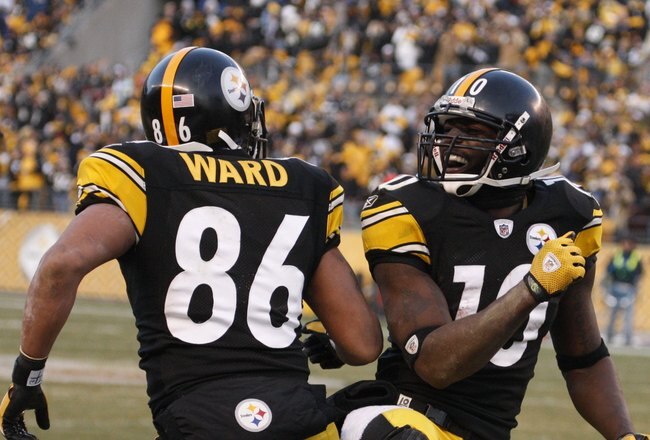 PITTSBURGH - DECEMBER 06:  Hines Ward #86 and Santonio Holmes #10 of the Pittsburgh Steelers celebrate during the game against the Oakland Raiders on December 6, 2009 at Heinz Field in Pittsburgh, Pennsylvania.  (Photo by Gregory Shamus/Getty Images)
