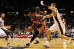 EAST RUTHERFORD, NJ - MARCH 03:  LeBron James #23 of the Cleveland Cavaliers controls the ball against the New Jersey Nets at the Izod Center on March 3, 2010 in East Rutherford, New Jersey.NOTE TO USER: User expressly acknowledges and agrees that, by downloading and or using this photograph, User is consenting to the terms and conditions of the Getty Images License Agreement.  (Photo by Jim McIsaac/Getty Images)