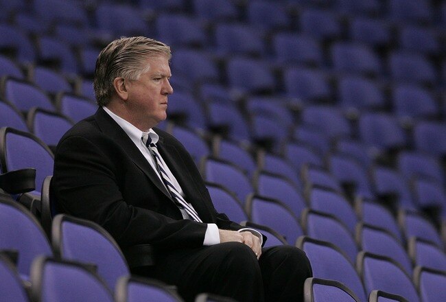 LONDON - SEPTEMBER 28:  Brian Burke, executive vice president and general manager of the Anaheim Ducks watches a practice session for the Los Angeles Kings and the Anaheim Ducks ice hockey teams at the O2 Arena on September 28, 2007 in Greenwich, London, England. (Photo by Bruce Bennett/Getty Images)