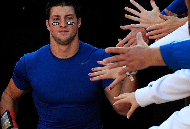 GAINESVILLE, FL - NOVEMBER 28:  Tim Tebow #15 of the Florida Gators shakes hands with the fans prior to the game against the Florida State Seminoles at Ben Hill Griffin Stadium on November 28, 2009 in Gainesville, Florida.  (Photo by Sam Greenwood/Getty Images)