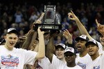 KANSAS CITY, MO - MARCH 13:  The Kansas Jayhawks display the trophy after defeating the Kansas State Wildcats to win the 2010 Phillips 66 Big 12 Men's Basketball Championship on March 13, 2010 at the Sprint Center in Kansas City, Missouri.  (Photo by Jamie Squire/Getty Images)