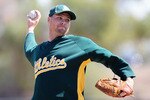 PHOENIX - MARCH 10:  Starting pitcher Ben Sheets #15 of the Oakland Athletics pitches against the Chicago White Sox during the MLB spring training game at Phoenix Municipal Stadium on March 10, 2010 in Phoenix, Arizona.  (Photo by Christian Petersen/Getty Images)