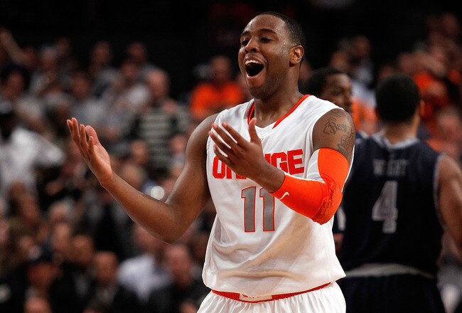 NEW YORK - MARCH 11:  Scoop Jardine #11 of the Syracuse Orange reacts after a call against the Georgetown Hoyas during the quarterfinal of the 2010 NCAA Big East Tournament at Madison Square Garden on March 11, 2010 in New York City.  (Photo by Michael Heiman/Getty Images)