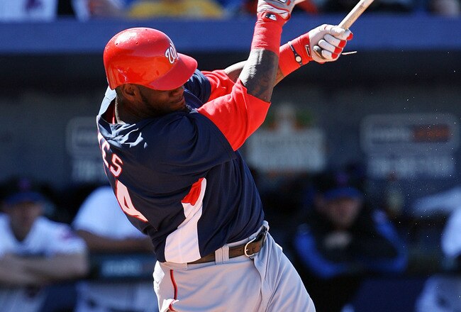 PORT ST. LUCIE, FL - MARCH 07:  Outfielder Elijah Dukes #34 of the Washington Nationals shatters his bat on a fielders choice against the New York Mets at Tradition Field on March 7, 2010 in Port St. Lucie, Florida.  (Photo by Doug Benc/Getty Images)
