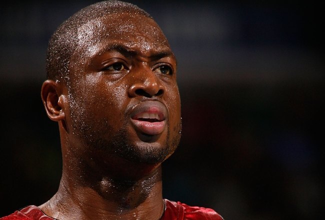 NEW ORLEANS - DECEMBER 30:  Dwyane Wade #3 of the Miami Heat looks on during the game against the New Orleans Hornets at New Orleans Arena on December 30, 2009 in New Orleans, Louisiana.  NOTE TO USER: User expressly acknowledges and agrees that, by downloading and/or using this Photograph, User is consenting to the terms and conditions of the Getty Images License Agreement.  (Photo by Chris Graythen/Getty Images)
