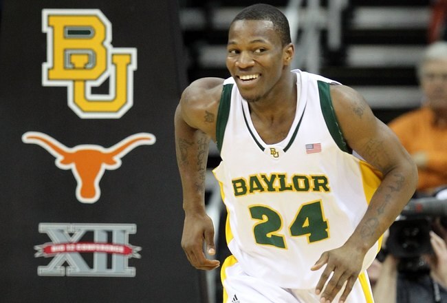 KANSAS CITY, MO - MARCH 11:  LaceDarius Dunn #24 of the Baylor Bears smiles during the quarterfinals of the 2010 Phillips 66 Big 12 Men's Basketball Tournament against the Texas Longhorns at the Sprint Center on March 11, 2010 in Kansas City, Missouri.  (Photo by Jamie Squire/Getty Images)