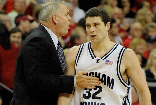 LAS VEGAS - MARCH 12:  Head coach Dave Rose of the Brigham Young University Cougars talks to Jimmer Fredette #32 on the sideline during a semifinal game against the UNLV Rebels in the Conoco Mountain West Conference Basketball tournament at the Thomas & Mack Center March 12, 2010 in Las Vegas, Nevada. UNLV won 70-66.  (Photo by Ethan Miller/Getty Images)