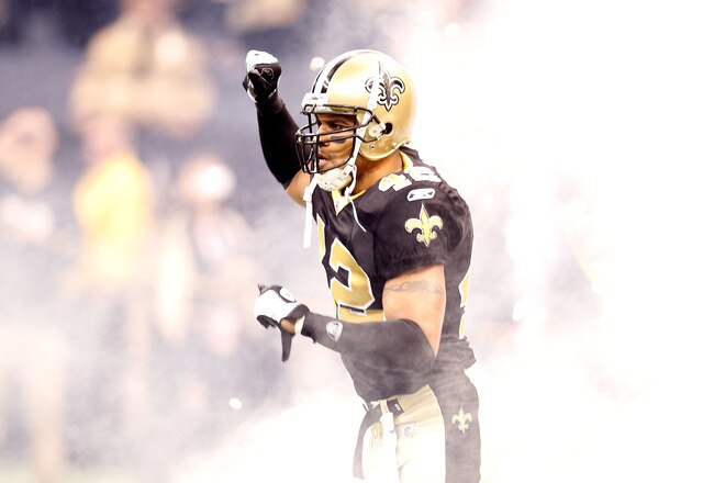 NEW ORLEANS - JANUARY 24:  Darren Sharper #42 of the New Orleans Saints runs on the field during player introductions against the Minnesota Vikings during the NFC Championship Game at the Louisana Superdome on January 24, 2010 in New Orleans, Louisiana.  (Photo by Chris Graythen/Getty Images)