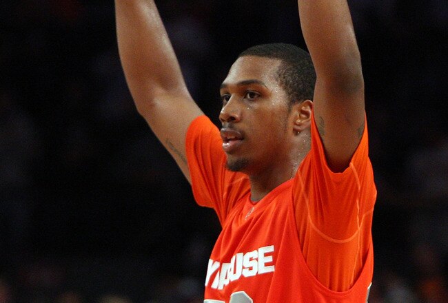NEW YORK - NOVEMBER 20:  Kris Joseph #32 of the Syracuse Orange celebrates after defeating the North Carolina Tar Heels in the championship game of the 2K Sports Classic on November 20, 2009 at Madison Square Garden in New York City. The Orange defeated the Tar Heels 87-71 to win the championship.  (Photo by Jim McIsaac/Getty Images)