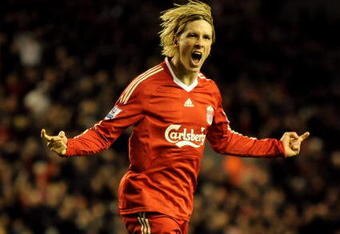 LIVERPOOL, ENGLAND - MARCH 15:  Fernando Torres of Liverpool celebrates scoring his team's fourth goal during the Barclays Premier League match between Liverpool and Portsmouth at Anfield on March 15, 2010 in Liverpool, England. (Photo by Michael Regan/Getty Images)