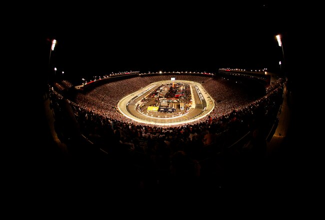 BRISTOL, TN - AUGUST 22:  A general view of cars racing during the NASCAR Sprint Cup Series Sharpie 500 at Bristol Motor Speedway on August 22, 2009 in Bristol, Tennessee.  (Photo by John Harrelson/Getty Images)
