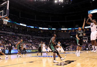 OKLAHOMA CITY - MARCH 18:  Jamar Samuels #32 of the Kansas State Wildcats attempts a shot against Tristian Thompson #14 of the North Texas Mean Green during the first round of the 2010 NCAA men's basketball tournament at Ford Center on March 18, 2010 in Oklahoma City, Oklahoma.  (Photo by Ronald Martinez/Getty Images)