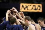 BOISE, ID - MARCH 20:  The Utah State Aggies huddle prior to their game against the Marquette Golden Eagles during the first round of the NCAA Division I Men's Basketball Tournament at the Taco Bell Arena on March 20, 2009 in Boise, Idaho.  (Photo by Jed Jacobsohn/Getty Images)