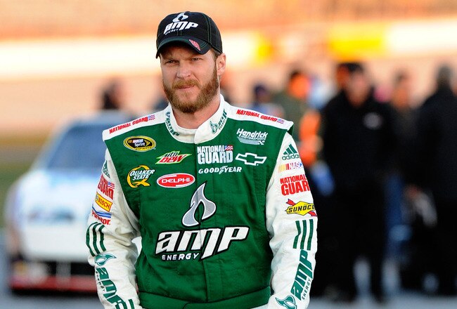 ATLANTA - MARCH 05:  Dale Earnhardt Jr., driver of the #88 AMP Energy/National Guard Chevrolet, walks on the grid during qualifying for the NASCAR Sprint Cup Series Kobalt Tools 500 at Atlanta Motor Speedway on March 5, 2010 in Hampton, Georgia.  (Photo by John Harrelson/Getty Images)