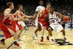 JACKSONVILLE, FL - MARCH 19:  Luis Guzman #10 of the Temple Owls is stopped while trying to drive against Chris Wroblewski #3, Ryan Wittman #20 and Jon Jaques #25 of the Cornell Big Red during the first round of the 2010 NCAA men's basketball tournament at Jacksonville Veteran's Memorial Arena on March 19, 2010 in Jacksonville, Florida. Cornell defeated Temple 78-65.  (Photo by Doug Benc/Getty Images)