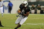 TAMPA, FL - OCTOBER 15:  Safety Nate Allen #5 of the University of South Florida Bulls intercepts a pass against the Cincinnati Bearcats October 15, 2009 at Raymond James Stadium in Tampa, Florida.  (Photo by Al Messerschmidt/Getty Images)