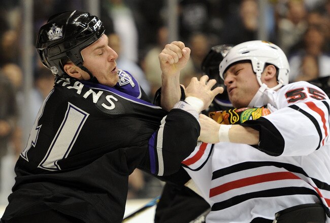 LOS ANGELES, CA - MARCH 18:  Raitis Ivanans #41 of the Los Angeles Kings takes an uppercut from Ben Eager #55 of the Chicago Blackhawks during the third period at the Staples Center on March 18, 2010 in Los Angeles, California.  (Photo by Harry How/Getty Images)