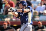 SCOTTSDALE, AZ - MARCH 04:  Corey Hart #1 of the Milwaukee Brewers bats against the San Francisco Giants during a spring training game at Scottsdale Stadium on March 4, 2010 in Scottsdale, Arizona.  (Photo by Chris McGrath/Getty Images)