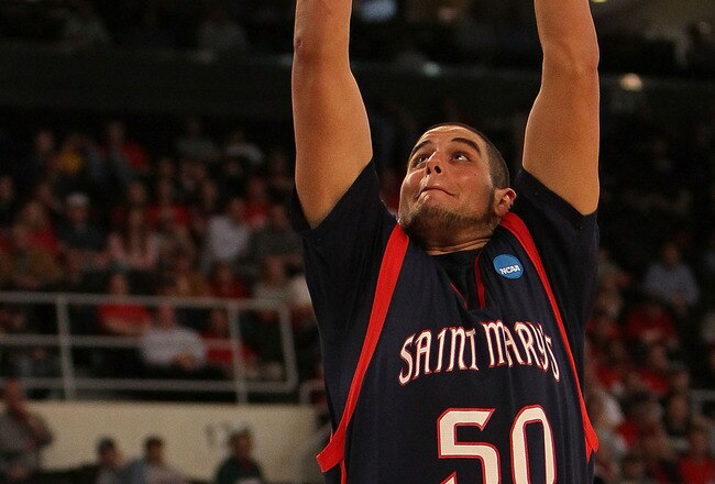 PROVIDENCE, RI - MARCH 18:  Omar Samhan #50 of the Saint Mary's Gaels drives to the basket against the Richmond Spiders during the first round of the 2010 NCAA men's tournament at Dunkin' Donuts Center on March 18, 2010 in Providence, Rhode Island. (Jim Rogash/Getty Images)