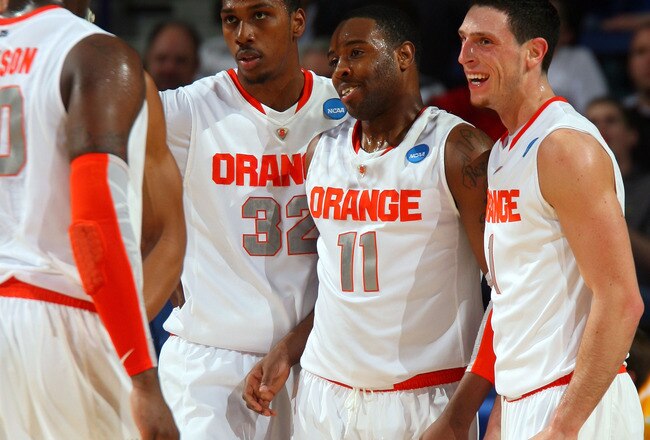 BUFFALO, NY - MARCH 19:  Rick Jackson #0, Kris Joseph #32, Scoop Jardine #11 and  Andy Rautins #1 of the Syracuse Orange react after a play against the Vermont Catamounts during the first round of the 2010 NCAA men's basketball tournament at HSBC Arena on March 19, 2010 in Buffalo, New York.  (Photo by Rick Stewart/Getty Images)