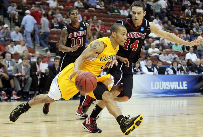 JACKSONVILLE, FL - MARCH 19: Jerome Randle #3 of the California Golden Bears drives around Kyle Kuric #14 of the Louisville Cardinals during the first round of the 2010 NCAA men's basketball tournament at Jacksonville Veteran's Memorial Arena on March 19, 2010 in Jacksonville, Florida. (Photo by Andy Lyons/Getty Images)