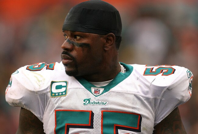 MIAMI - JANUARY 03:  Linebacker Joey Porter #55 of the Miami Dolphins looks on as the last few moments of the game tick away against the Pittsburgh Steelers calls out a play at the line of scrimmage at Land Shark Stadium on January 3, 2010 in Miami, Florida. The Steelers defeated the Dolphins 30-24.  (Photo by Doug Benc/Getty Images)