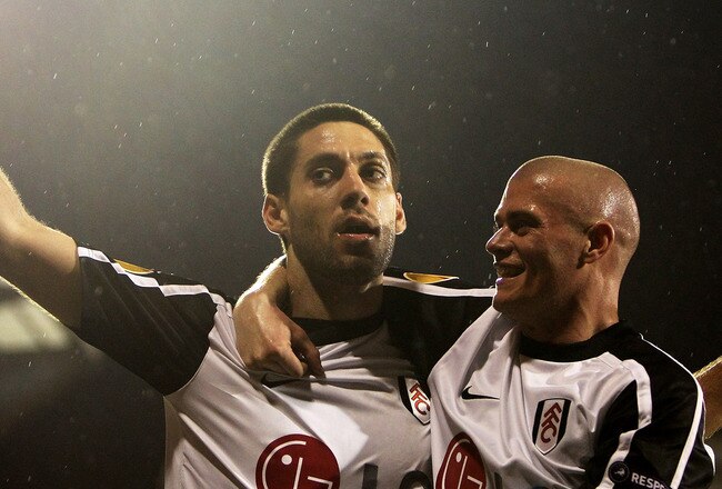 LONDON, ENGLAND - MARCH 18:  Clint Dempsey (L) of Fulham celebrates scoring with Paul Konchesky during the UEFA Europa League Round of 16 second leg match between Fulham and Juventus at Craven Cottage on March 18, 2010 in London, England.  (Photo by Phil Cole/Getty Images)