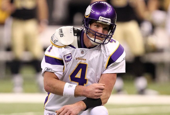 NEW ORLEANS - JANUARY 24:  Brett Favre #4 of the Minnesota Vikings picks himself off the turf against the New Orleans Saints during the NFC Championship Game at the Louisana Superdome on January 24, 2010 in New Orleans, Louisiana. The Saints won 31-28 in overtime. (Photo by Ronald Martinez/Getty Images)