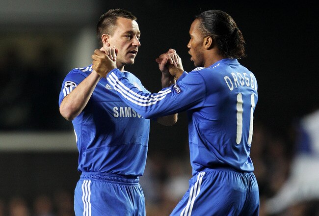 LONDON, ENGLAND - MARCH 16:  John Terry of Chelsea encourages team mate Didier Drogba ahead of the UEFA Champions League Round of 16 second leg match between Chelsea and Inter Milan at Stamford Bridge on March 16, 2010 in London, England.  (Photo by Phil Cole/Getty Images)