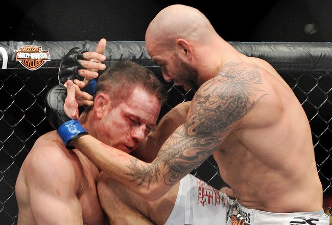 LAS VEGAS - NOVEMBER 21: Ben Saunders (R) battles Marcus Davis (L) during their Welterweight Fight at the UFC 106 at Mandalay Bay Events Center on November 21, 2009 in Las Vegas, Nevada. (Photo by Jon Kopaloff/Getty Images)