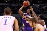OKLAHOMA CITY - MARCH 20:  Kwadzo Ahelegbe #11 of the Northern Iowa Panthers attempts a shot against the Kansas Jayhawks during the second round of the 2010 NCAA men's basketball tournament at Ford Center on March 20, 2010 in Oklahoma City, Oklahoma.  (Photo by Ronald Martinez/Getty Images)