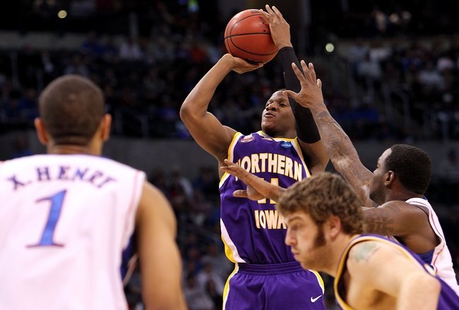 OKLAHOMA CITY - MARCH 20:  Kwadzo Ahelegbe #11 of the Northern Iowa Panthers attempts a shot against the Kansas Jayhawks during the second round of the 2010 NCAA men's basketball tournament at Ford Center on March 20, 2010 in Oklahoma City, Oklahoma.  (Photo by Ronald Martinez/Getty Images)
