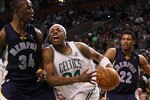 BOSTON - MARCH 10:  Paul Pierce #34 of the Boston Celtics tries to get around Hasheem Thabeet #34  of the Memphis Grizzlies on March 10, 2010 at the TD Garden in Boston, Massachusetts. The Grizzlies defeated the Celtics 111-91. NOTE TO USER: User expressly acknowledges and agrees that, by downloading and or using this photograph, User is consenting to the terms and conditions of the Getty Images License Agreement.  (Photo by Elsa/Getty Images)