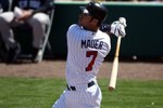 FORT MYERS, FL - MARCH 07:  Joe Mauer #7 of the Minnesota Twins hits against the New York Yankees at Lee County Sports Complex  on March 7, 2010 in Fort Myers, Florida.  (Photo by Marc Serota/Getty Images)