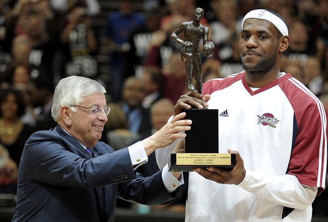 CLEVELAND - MAY 05:  LeBron James #23 of the Cleveland Cavaliers receives 2008-2009 MVP trophy from NBA Commissioner David Stern prior to playing the Atlanta Hawks in Game One of the Eastern Conference Semifinals during the 2009 NBA Playoffs at Quicken Loans Arena on May 5, 2009 in Cleveland, Ohio.  NOTE TO USER: User expressly acknowledges and agrees that, by downloading and or using this photograph, User is consenting to the terms and conditions of the Getty Images License Agreement.  (Photo by Gregory Shamus/Getty Images)